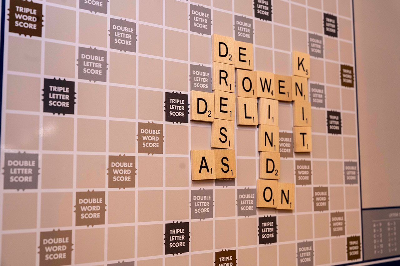 Grab a friend and play a game of wall scrabble